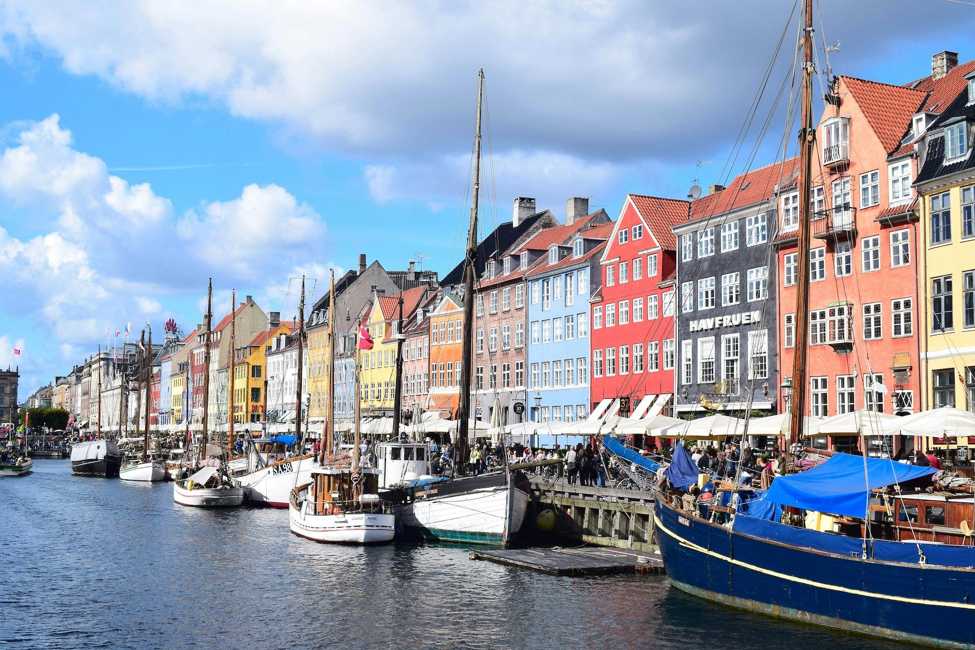 Consid in Copenhagen Denmark. Nyhamn with boat harbor and colorful buildings